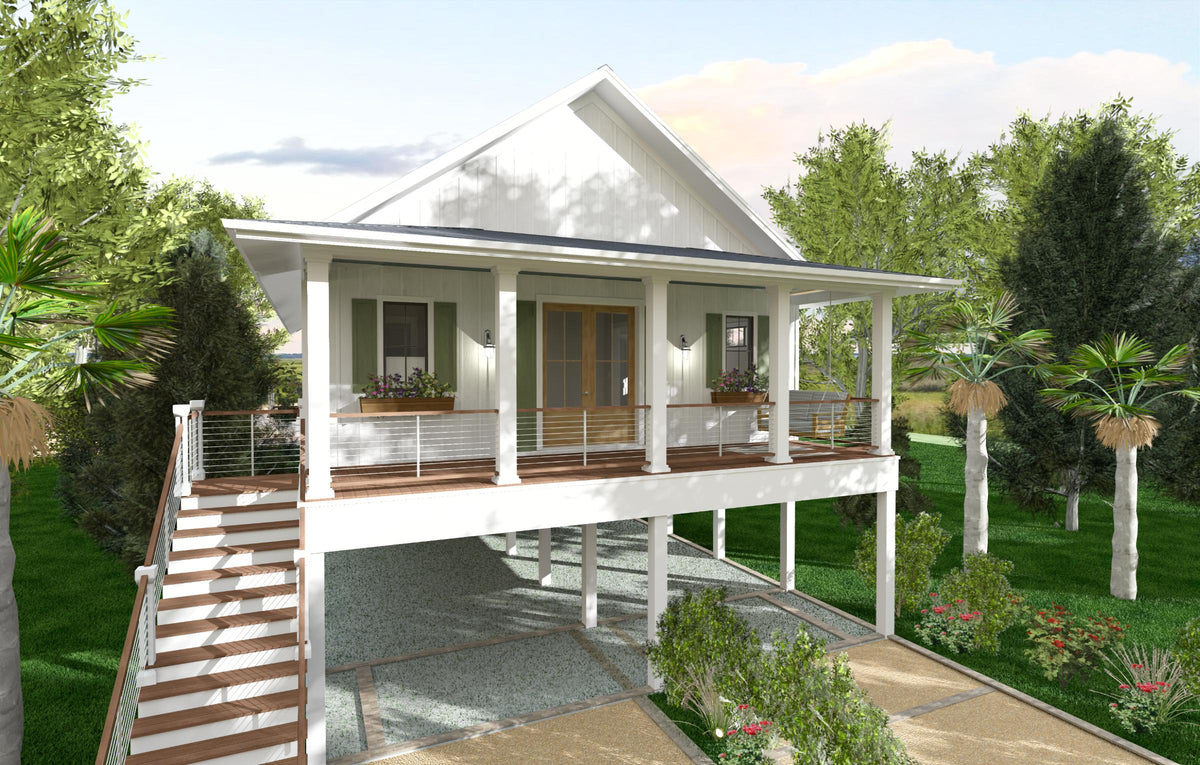 Magnolia Beach Hut, an elevated coastal house raised on pilings, with a covered porch across the front and a stair up from the ground