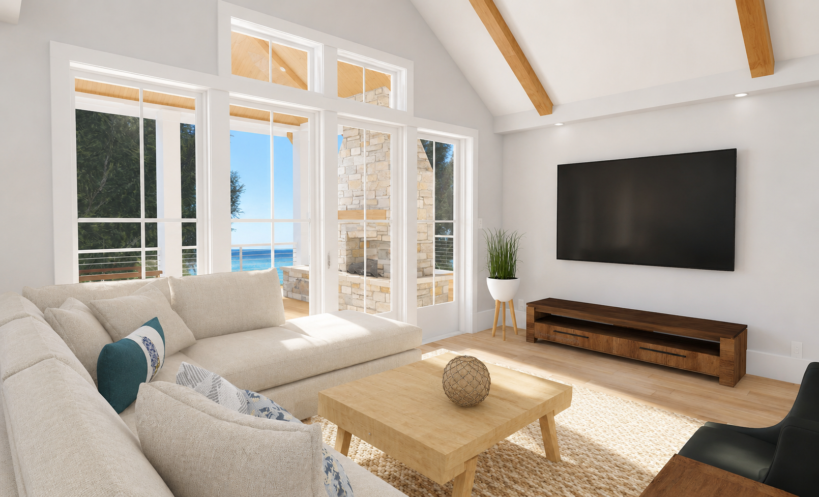 Spacious vaulted living area of the Palmetto Beach Hut, featuring an open-concept layout, modern coastal decor, and large windows with panoramic views of the outdoors.
